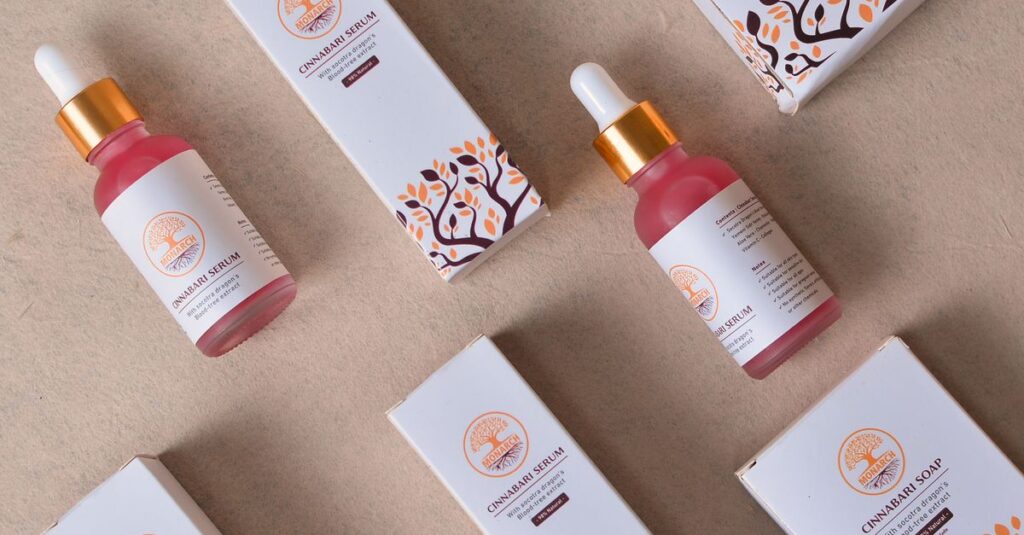 Flat lay of cosmetic serum bottles and boxes for beauty and skincare.