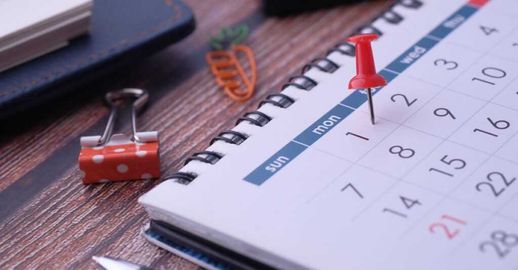 Desk elements like calendar and pins for effective planning.
