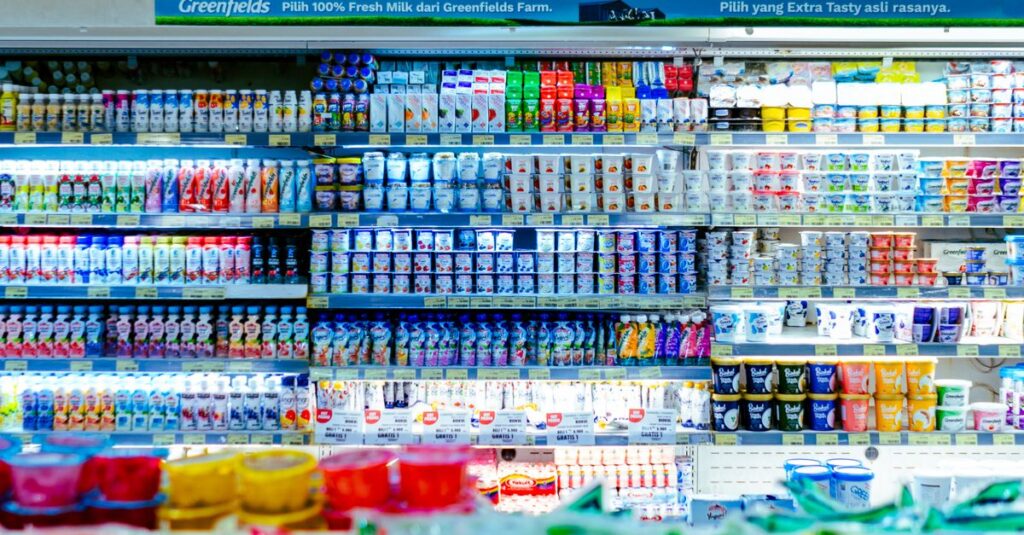 Vibrant shelves of diverse dairy products in a West Java supermarket.