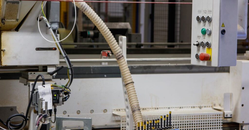 Close-up of automated machinery in an industrial factory setting, perfect for industry and technology themes.