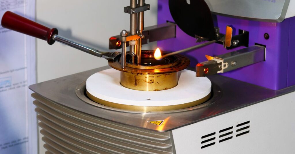A digital Pensky-Martens closed cup tester used in a lab to determine flash points.