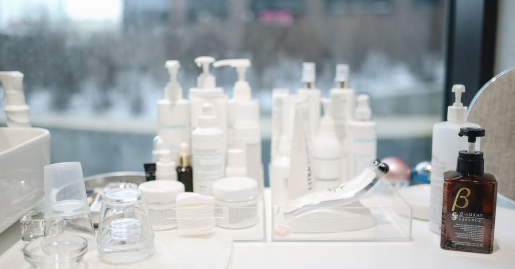 A collection of skincare products on a countertop in a contemporary beauty salon setting.