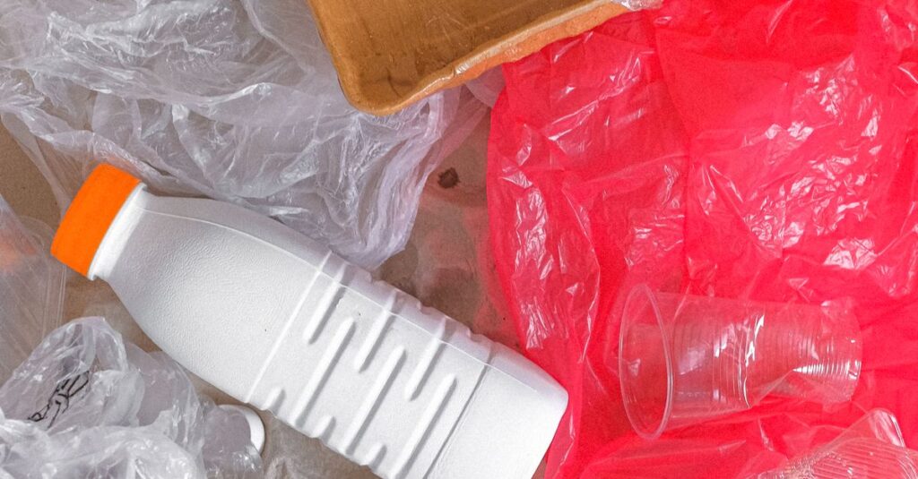 Overhead view of mixed plastic waste for recycling awareness.