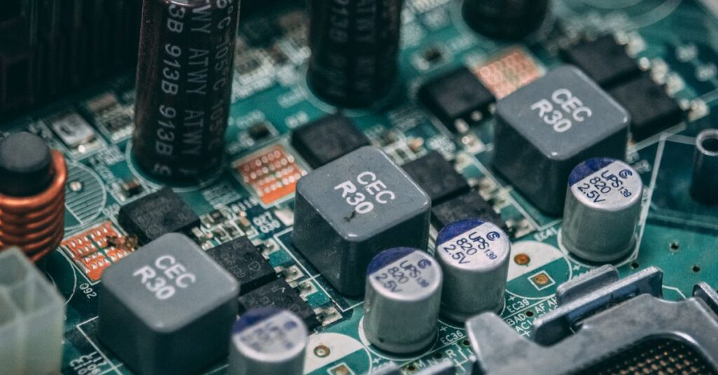 Detailed view of electronic components on a circuit board showcasing capacitors and semiconductors.